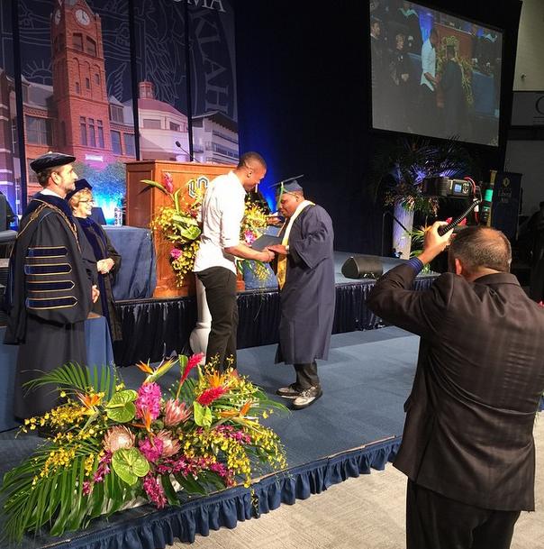 OKC Thunder Russell Westbrook hands his brother diploma after